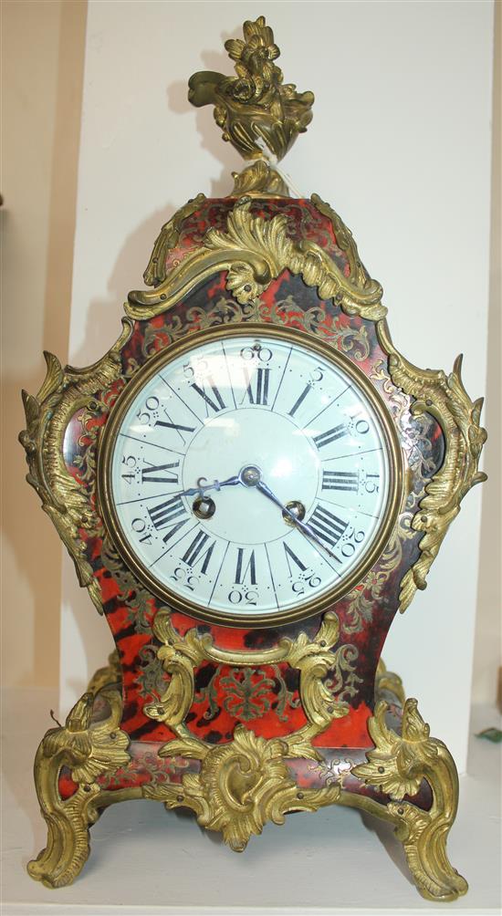 A French ormolu mounted red boulle mantel clock, 16in.